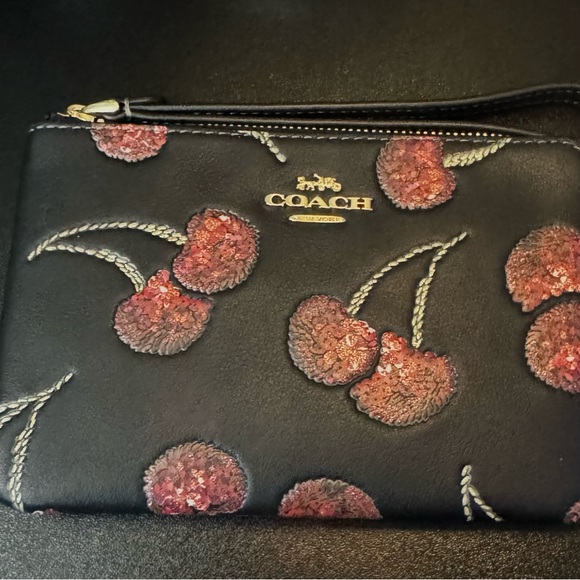 Coach Handbags - Coach Black Wristlet with Cherry design
